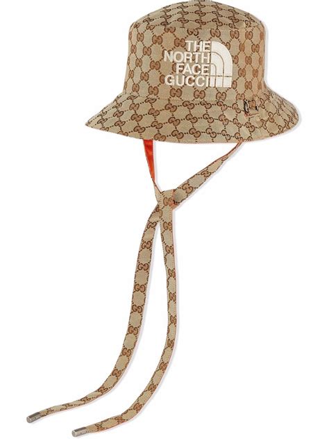 The North Face x Gucci reversible bucket hat .